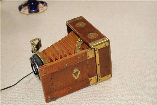 A Compur Tropical cased camera with Dialytar lens and gilt brass mounted teak case, height 18cm, depth when closed 6cm, length when